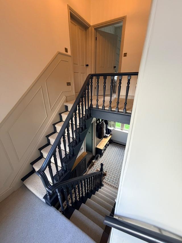 Staircase spindles and hallway panelling