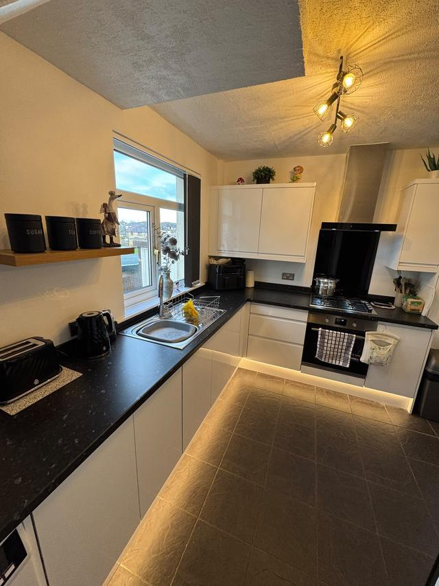 Kitchen with plinth lighting