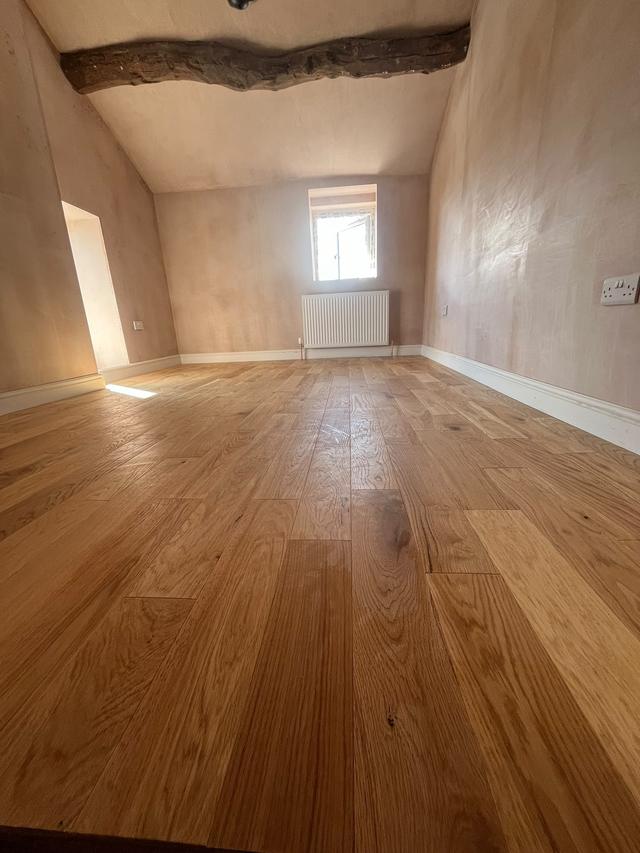 Solid oak floor in a loft room