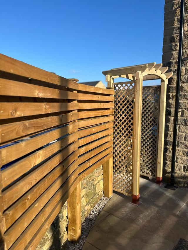 Pergola arch and slatted fence detail
