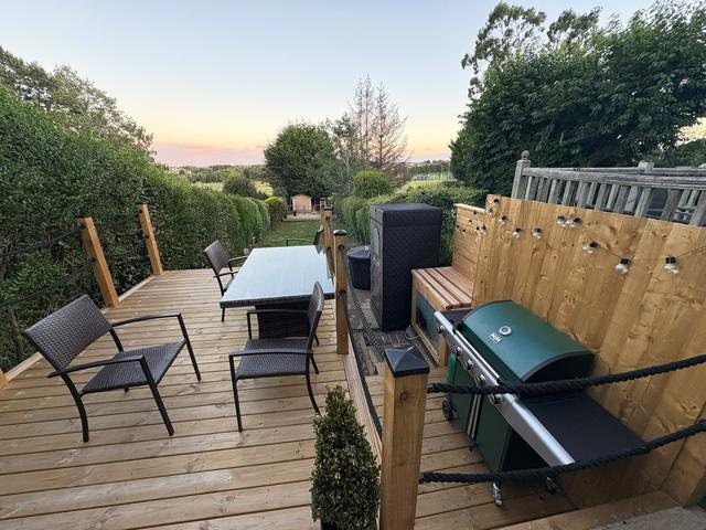 Decking with built-in BBQ area at sunset
