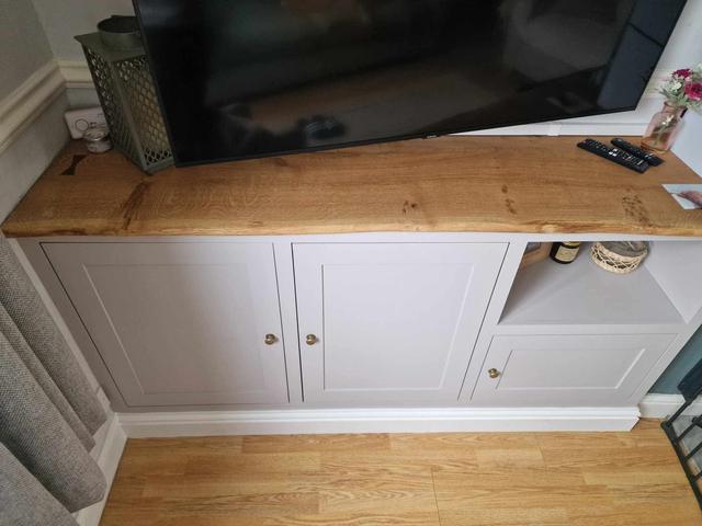 Fitted TV unit with rustic oak top