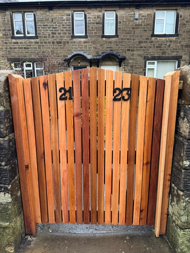 Arched timber garden gate